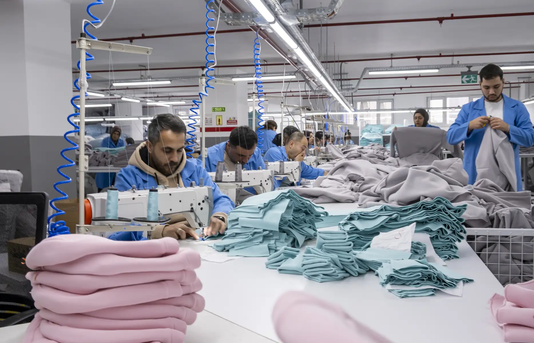 Cutting and sewing garment production inside an Istanbul clothing factory