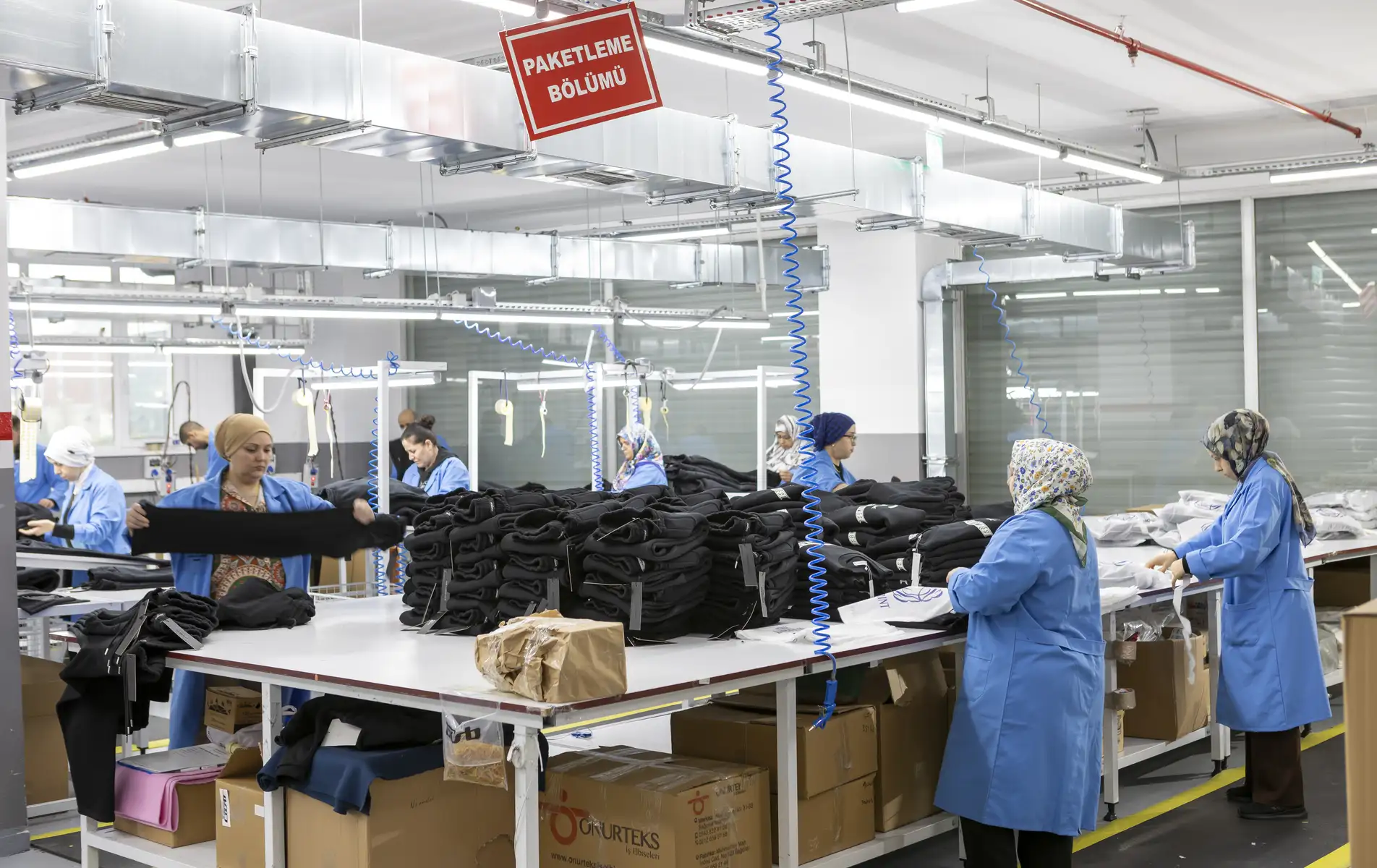Garment quality control and final inspection at an Istanbul clothing manufacturer